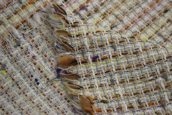 In Stock Wholesale of a Roll New Design 100 Polyester Tweed Fabric for Women's Coat Clothing in Autumn and Winter